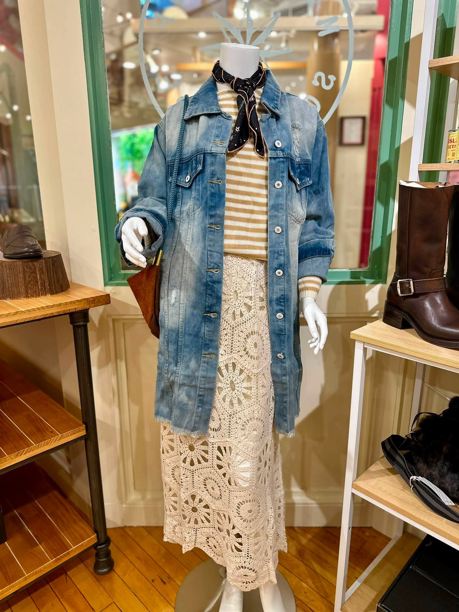 A layered denim and crochet outfit styled in the shop